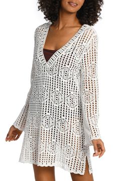 Crochet-inspired stitches lend delicate charm to this long-sleeve cover-up dress made of breezy cotton with abbreviated slits at the sides. 32" length (size Medium) V-neck Long sleeves Sheer; base layer shown not included 100% cotton Hand wash, dry flat Imported Chic Fitted Long Sleeve Cover-up, Elegant Fitted Long Sleeve Cover-up, Spring Fitted Long Sleeve Cover-up, Fitted Long Sleeve Cover-up For Spring, Fitted Long Sleeve Spring Cover-up, Fitted Long Sleeve Summer Cover-up, White Long Sleeve Open Knit Cover-up, White Long Sleeve Beach Dress, Chic White Long Sleeve Tunic