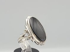 stars Timeless Oval Black Enamel Jewelry, Modern Oval Black Enamel Rings, Fine Jewelry Onyx Oval Ring, Fine Jewelry Oval Onyx Ring, Oval White Gold Jewelry With Black Enamel, Formal Oval Onyx Rings, Formal Oval Jewelry With Polished Edges, Polished Oval Onyx Jewelry, Formal Oval Onyx Jewelry