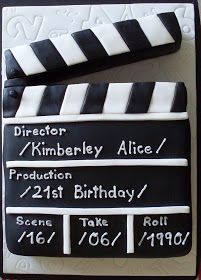 a birthday cake made to look like a movie clapper