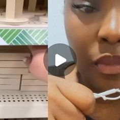 a woman is brushing her teeth in front of a shelf with toothpaste on it