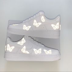 Custom Reflective Butterfly Airforce1 Shoe Color: White Or Black Shoe Butterfly Color: Reflective Or Rainbow Reflective Reflective Effect Happens When Light Hits The Image Directly Cool Sneakers For Men And Women Please Allow 5-7 Business Days For Delivery You Can Also Purchase These Kicks For Cheaper On My Second Platform Go Head Check Out The Link In The Bio:) By Clicking The Button Abou Luxury Nike Air Force 1 For Men, Butterfly Air Jordans, Custom Shoes Nike Air Force Butterfly, Butterfly Nike Air Force, Nike Air Force 1 Reflective, White High-top Nike Air Force 1 With Translucent Outsole, Nike Air Force 1 With Translucent Outsole For Sports, Nike Air Force 1 White With Translucent Outsole, White Nike Air Force 1 With Translucent Outsole