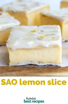 lemon slice with white icing on a cutting board