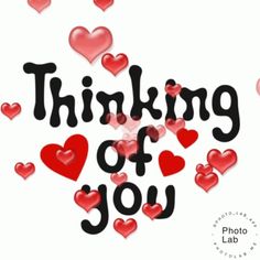 the words thinking of you surrounded by hearts