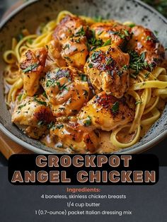 a bowl filled with chicken and noodles on top of a table