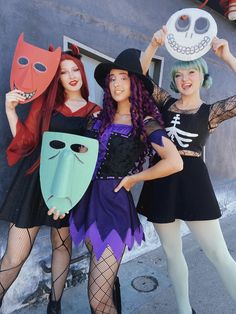 three women dressed up in halloween costumes