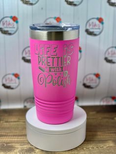 a pink tumbler cup with the words life is better with a polish on it