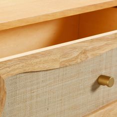 a close up of a drawer with wood handles