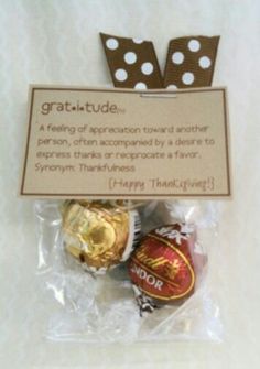 chocolate candies wrapped in cellophane and decorated with white polka dots on top