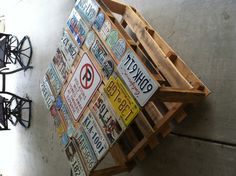 a table made out of old license plates