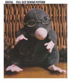 a stuffed animal with glasses on it's head