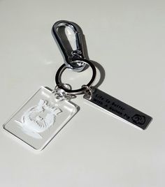 a keychain with a photo of a dog on it