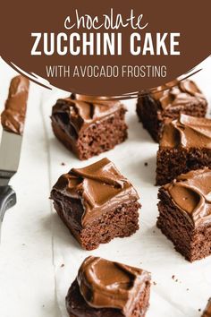 chocolate zucchini cake with avocado frosting on a white platter