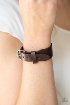 Gradually narrowing in width, a plain brown leather band buckles around the wrist for a rustic flair. Features an adjustable buckle closure. Sold as one individual bracelet. Paparazzi Fashion, Brown Leather Bracelet, Brown Bracelet, Jewelry Catalog, Paparazzi Accessories, Paparazzi Jewelry, Chic Accessories, Leather Band, Bracelets For Men