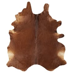 a brown and white cowhide rug on a white background