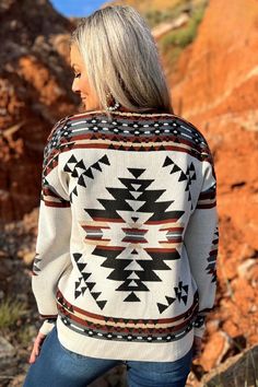 Cozy up and stand out in our Lean On Me Knit Sweater, featuring an eye-catching Aztec print. Perfect for colder weather, this sweater will keep you both warm and stylish. Don't lean on anyone else, this sweater has got you covered! Fabric Content: 85% polyester, 10% polyamide, 5% spandex Size Fits XS 0 Small 2/4 Medium 6/8 Large 10/12 XL 14/16 2X 18/20 3X 22/24 Measurements below are with the top laid flat. SIZE CHEST LENGTH SLEEVE WIDTH SLEEVE LENGTH XS 21.5" 24.5" 3.5" 20.5" S 22" 25" 3.5" 20. Nfr Style, Authentic Turquoise Jewelry, Duster Dress, Lean On Me, Red Knit Sweater, Western Graphic Tees, Horse Boots, Lean On