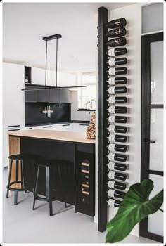 a black and white kitchen with an island