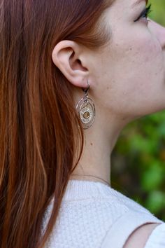 Triple ring mixed metal charm earrings with cubic z. inner charm held on gold-plated leverbacks Nickel-free Mixed Metal Earrings As A Gift, Everyday Metal Earrings With French Hook, Triple Ring, Princess Mononoke, Metal Charm, Shoe Charms, Mixed Metals, Charm Earrings, Earring Necklace