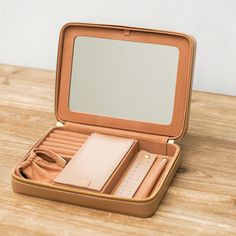 The perfect travel companion, this jewelry case is both stylish and functional. Made with 100% vegan leather, it comes in a beautiful sand color and has plenty of room to store your favorite pieces. It also features a convenient zip closure and is the perfect size to take with you on the go. Childrens Shop, Jewelry Roll, Container Shop, Cool Notebooks, Travel Jewelry Case, Jewel Case, Melting Candles, Camping Accessories, Frame Wall Decor