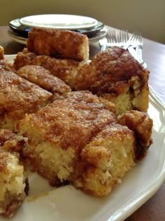 several pieces of cake on a white plate