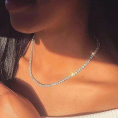 Description: Introducing our exquisite Luxury Cubic Zirconia Crystal Tennis Chain Choker, a must-have accessory that combines opulence with urban flair. Crafted from durable stainless steel, this choker exudes luxury with its sparkling cubic zirconia crystals, meticulously set along the chain. Designed for the modern woman who loves to make a statement, this choker adds a touch of glamour to any ensemble, whether it's for a night out or a casual day on the town. Its sleek and stylish design effo Tennis Chain Necklace, Rock Necklace, Choker Style Necklace, Tennis Chain, Choker Style, Timeless Accessories, Special Event