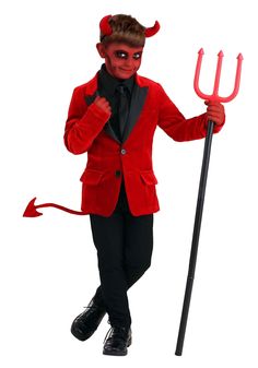 a man dressed in devil costume holding a pitchfork