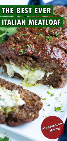 the best ever italian meatloaf is on a plate with bread and parsley