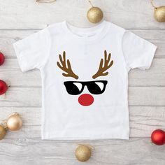 Looking for a cute tee for your kids? We have the perfect Reindeer Boy graphic tee addition to their closet! Boys Christmas Shirt, Boy Toddler, Boys Graphic Tee, Boys Christmas, Christmas Shirt, Christmas Tshirts, Christmas Shirts, Toddler Boys, Reindeer