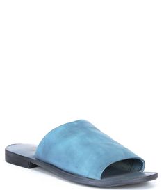 From Free People, the Vicente Leather Slide Sandals feature:Leather upperSlide-on stylingLeather liningSynthetic outsoleFlat heelImported. Blue Open Toe Sandals With Textured Sole, Blue Textured Sole Sandals With Open Toe, Blue Textured Sole Open Toe Sandals, Spring Closed Toe Slides With Leather Sole, Summer Leather Mules With Rubber Sole, Blue Leather Slides For Summer, Leather Closed Toe Slides For Spring, Leather Slides With Textured Sole And Single Toe Strap, Blue Leather Slide Sandals