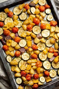 roasted vegetables on a baking sheet ready to be cooked