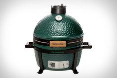 the big green egg cooker is on display