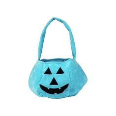 a small blue bag with a pumpkin face on it's front and side handles