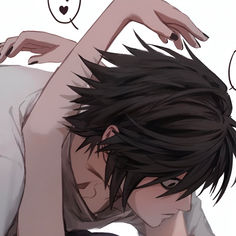 an anime character with black hair laying on the ground and holding his hand up to his head