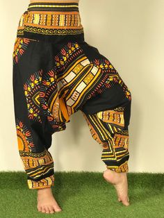 "Dashiki Design, Harem Pants ,Handmade pants, Thick Smock Waist Low Crotch,Bohemian Harem cotton pants, African Dashiki Harem, Aladdin harem pants are very roomy, loose fitting and extremely comfortable. Elasticated both at the waist and ankle, with the crotch just below the knee. Bohemian Harem Unisex pants, Aladdin pants, Baggy Pants, Drop Crotch Pants. Dashiki pants, Yoga pants, Boho Hippi pants. *Fabric Type: Best Quality Fabric Cotton 100%. *Elastic Waist and around ankle. *Quality sewing. Cotton Hippie Pants With Boho Print, Hippie Style Cotton Pants With Boho Print, Hippie Cotton Pants With Boho Print, Hippie Boho Print Cotton Pants, Casual Cotton Harem Pants With Boho Print, Cotton Boho Print Hippie Bottoms, Cotton Hippie Bottoms With Boho Print, Hippie Cotton Bottoms With Boho Print, Cotton Hippie Harem Pants For Yoga