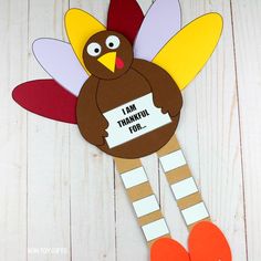 a paper turkey with a sign that says i am thanksgiving