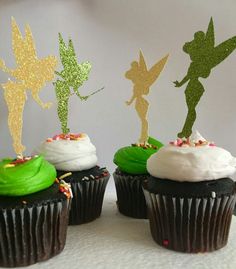 three cupcakes with green frosting and tinker fairy toppers