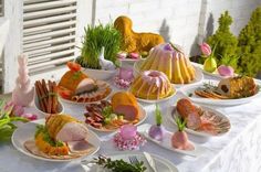 a table topped with lots of different types of food