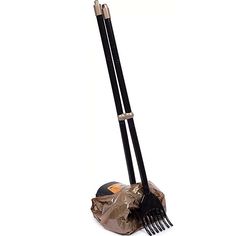 two black brooms and a brown bag on a white background