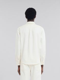 Long-sleeved shirt made from cotton drill. Snap button closure and cuffs. Hand-stitched Marni Mending logo on the chest pocket with flower detail. White Shirt With Patch Pockets And Spread Collar, White Cotton Shirt With Lapel Collar, White Lapel Collar Cotton Shirt, Cotton Dress Shirt With Lapel Collar, Flat Heel Boots, Trunk Bag, Flower Detail, Women Essentials, Lacing Sneakers