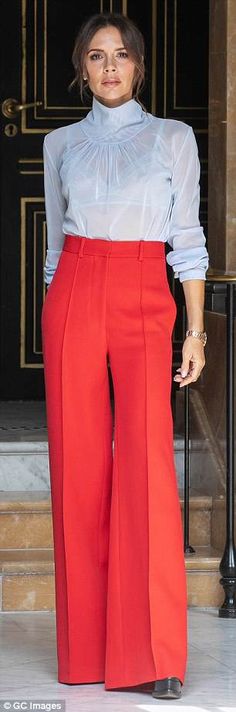 Upping the ante: The Spice Girl donned a pair of red wide-leg trousers, tied in with her platform heels Red Trousers Outfit, Victoria Beckham Style, Looks Street Style, Red Pants, Black Women Fashion, Work Fashion, Red Fashion, Fashion Classy, Victoria Beckham