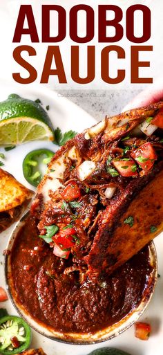 the cover of an adobo sauce recipe on a white plate with limes