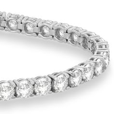 Style Number - AZ18686
This fancy luxury lab grown diamond tennis link bracelet for women features 43 brilliant-cut round bright near-colorless lab grown diamonds of F-G Color, SI Clarity.The 20 pointer lab grown diamonds on this stylish bridal bracelet are elegantly set in a classic 14kt white gold four prong basket setting.This unique 7 inch lab grown diamond tennis eternity bracelet has a total of 10.01 carats of lab grown diamonds.Mix and match with our other modern fine lab grown diamond je Luxury Round Tennis Bracelet With Lab Grown Diamonds, Luxury Lab Grown Diamond Tennis Bracelet With Prong Setting, White Gold Lab-grown Diamond Tennis Bracelet With Prong Setting, White Gold Tennis Bracelet With Lab Grown Diamonds, Luxury Tennis Bracelet With Lab Grown Diamonds, White Gold Lab Grown Diamond Tennis Bracelet, White Gold Tennis Bracelet With Brilliant Cut Lab-grown Diamonds, White Gold Tennis Bracelet With Lab-grown Diamonds, Luxury Lab-grown Diamond Tennis Bracelet