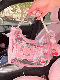 This coquette themed shoulder bag is perfect for everyday use! Will fit a large size phone or wallet and all your essentials ! These bags are customized by me only. Please allow up to a week after ordering for your bag to ship ! No cancellations after 3 days of ordering and no refunds or returns unless the bag was received damaged. I do not control the shipping process so please keep up with your tracking numbers as I am not responsible for lost packages. Purses Coquette, Coquette Cherry, Cherry Bag, Bag Transparent, Kawaii Core, Girly Bags, Cute Bags, Pink Bag, Cute Pink