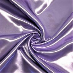 The bridal satin is a luxurious satin fabric. It is 60" wide, 160GSM, and 100% polyester. Known for its silky smooth touch and radiant colors, this high quality satin is ideal for: -glamorous gowns -bridal wear -bridesmaid dress -cocktail dresses -blouses and many other forms of apparel! The bridal satin has a sturdy body and a soft drape which makes it great for curtains, drapes, table sashes and other event decor. It is your go to fabric for a medium-heavy drape that shines and shimmers. Large Bulk Fabric, Satin Fabrics, Crystal Wedding Dress, Silver Cocktail Dress, Dress Fabrics, Satin Pillowcase, Sewing Fabrics, Wedding Dress Fabrics, Alphabet Preschool