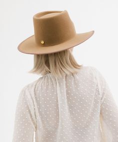 Watch out western trends -- the June Teardrop Rancher is a felt Western hat with our own modern twist. Featuring a teardrop-shaped crown paired with an angled Western brim, this western inspired silhouette is ready to accompany you from countryside to the town. Bound with a tonal grosgrain ribbon around the brim edge for added detail. Bands shown are sold separately HERE! Hat Trends, Tall Crown, Measuring Stick, Western Trend, Modern Cowgirl, Western Hat, Halo Style, Wearing A Hat, Western Hats