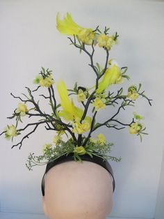 "* This black branch headpiece features retro black and yellow bumble bees and pearl enhanced butterflies. The yellow feathered birds make this an eye catching design for summer and the petite yellow flowers bring all the elements together. Made specifically for the gal who loves the sweet honey of the bee, the fluttering butterflies and the perched feather birds and has a great sense of humor! * It's well balanced and comfortable and made to sit directly on top of the head. * Branches are acryl Black Feather Headpiece For Spring, Spring Evening Yellow Headpieces, Yellow Evening Headpieces For Spring, Yellow Spring Headband, Branch Headpiece, Fluttering Butterflies, Yellow Feathers, Birds And The Bees, Yellow Pearl