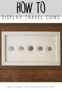 the words how to display travel coins in a white frame