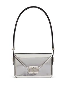 silver-tone calf leather mirror effect VLogo Signature platinum-plated hardware adjustable shoulder strap foldover top snap-lock closure main compartment internal patch pockets Tone Calves, Leather Mirror, Valentino Garavani Bag, Small Letter, Letter Bag, Metallic Look, Women's Bags By Style, Bag Silver, Small Letters