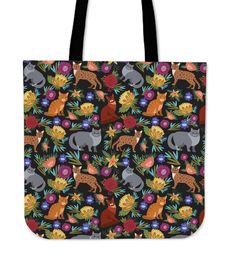 a black tote bag with colorful cats and flowers on the front, featuring an image of