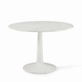 a white table with a round top on a white background, it appears to be empty