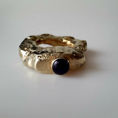 RARE FINDS 18ct yellow gold plated on sterling silver. Solid sterling silver Stamped and tested ring Amethyst gemstone  Ring size UK K1/2 USA 5.5 Heavy weight ring A brutalist sterling silver ring plated with 18ct gold, a bold and unique piece of jewelry that is characterized by its rough, industrial aesthetic. The ring is typically made of solid sterling silver, plated in 18ct gold and  is left unrefined to create a rugged, textured finish. The design of the ring is often asymmetrical and irregular, with a raw, unfinished look that emphasizes the natural qualities of the metal. The band of the ring may be thick and chunky, with a rough, hammered texture that adds to its industrial feel. Please note that due to the design of this ring the inner shank diameter is not fully circular. The siz Ornate Ring, Unique Rings Vintage, Handmade Silver Ring, Green Chalcedony, Statement Ring Silver, Grunge Punk, Antique Earrings, Silver Gifts, Amethyst Gemstone